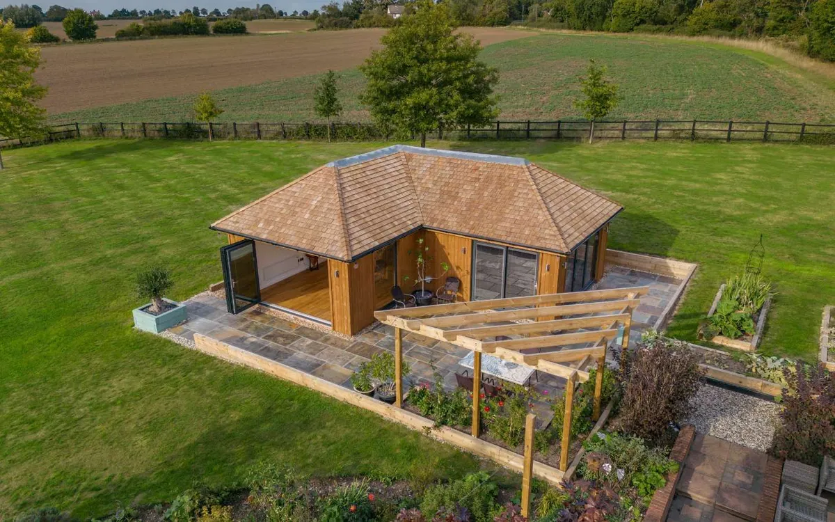 What is the difference between a conservatory and garden room?